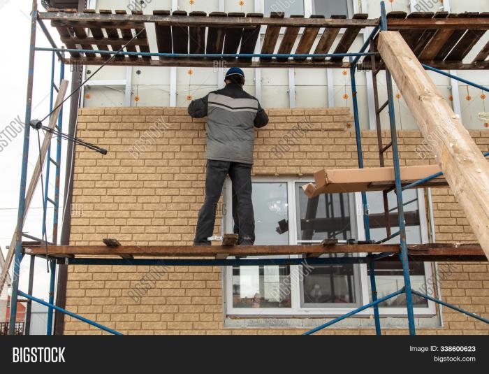 Installing sheathing on exterior walls