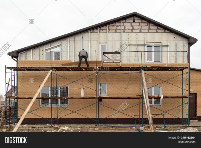 Installing sheathing on exterior walls